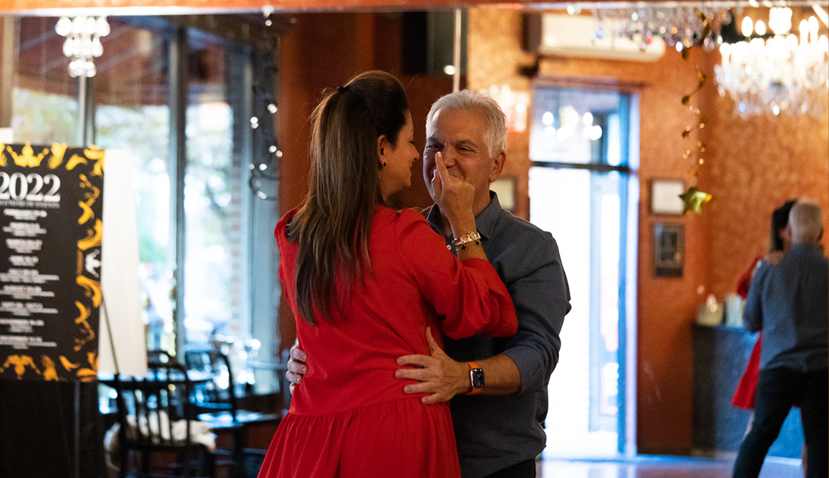 A man and a woman in a sweet embrace.