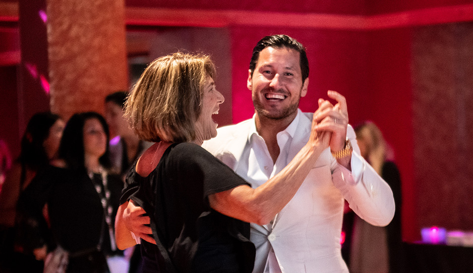 Instructor and student sharing a close-embrace tango lesson