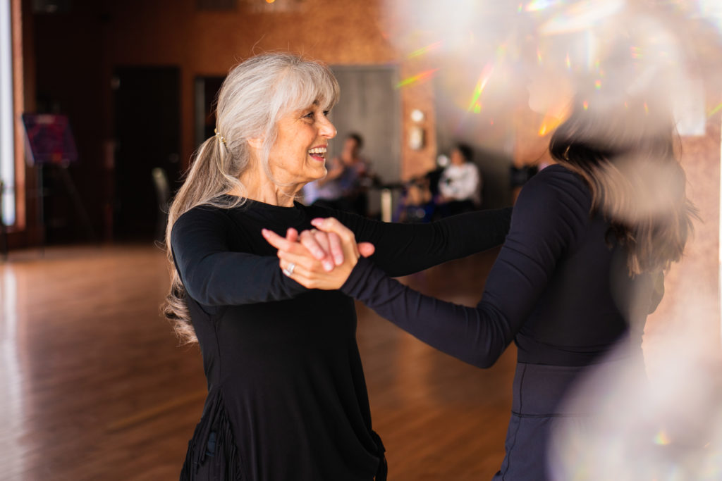 Dance student smiles and learns waltz