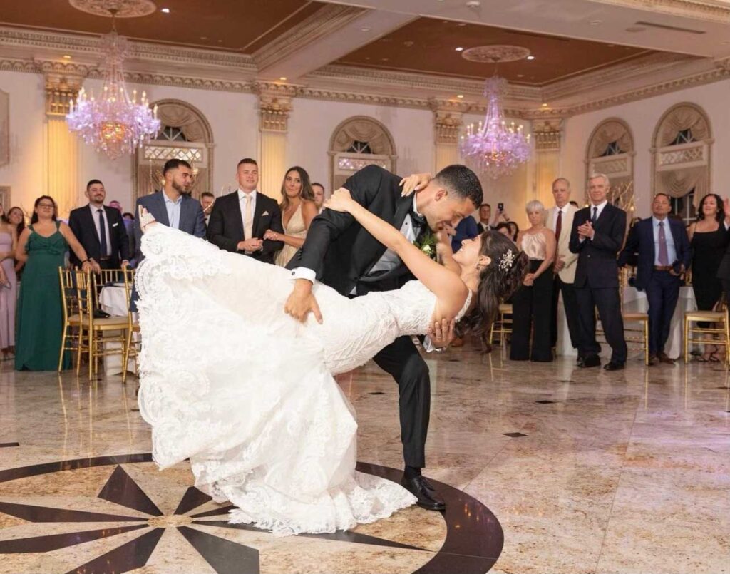 Bride and groom practicing their first dance choreography for an NYC wedding.