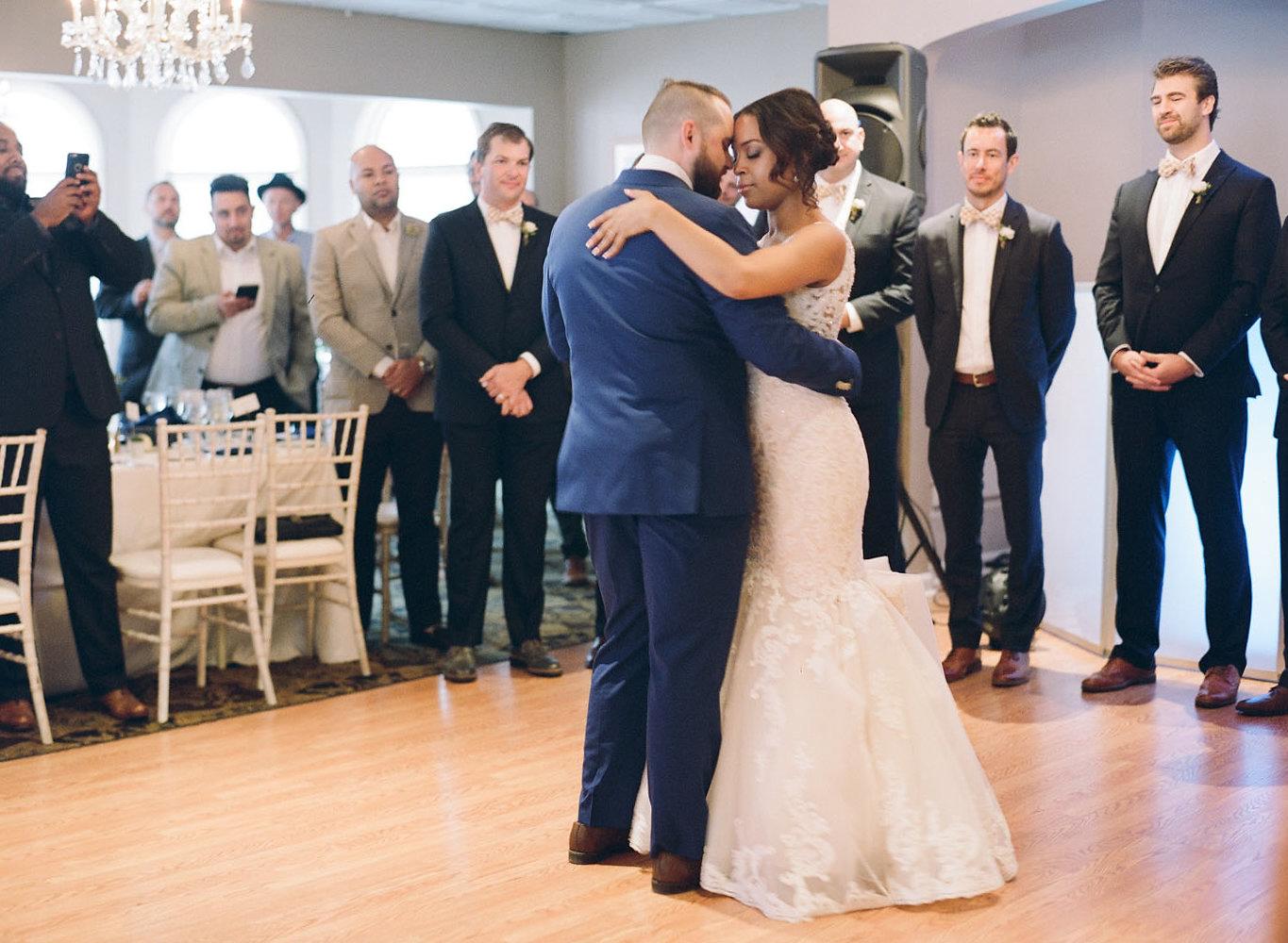 Wedding party performing a choreographed group routine at a Fort Worth reception