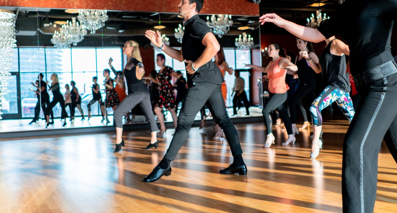 Group partner dance class in the Dance With Me Buckhead studio, Atlanta